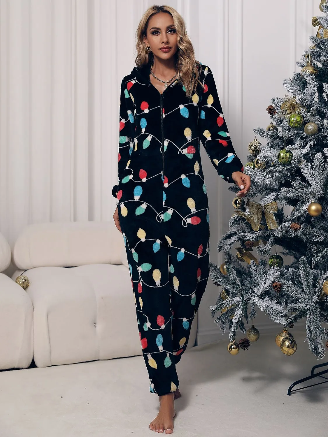 Lounge-Jumpsuit mit Reißverschluss vorne, Kapuze und Taschen