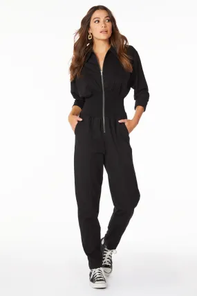 SMOCKED WAIST ZIP FRONT JUMPSUIT